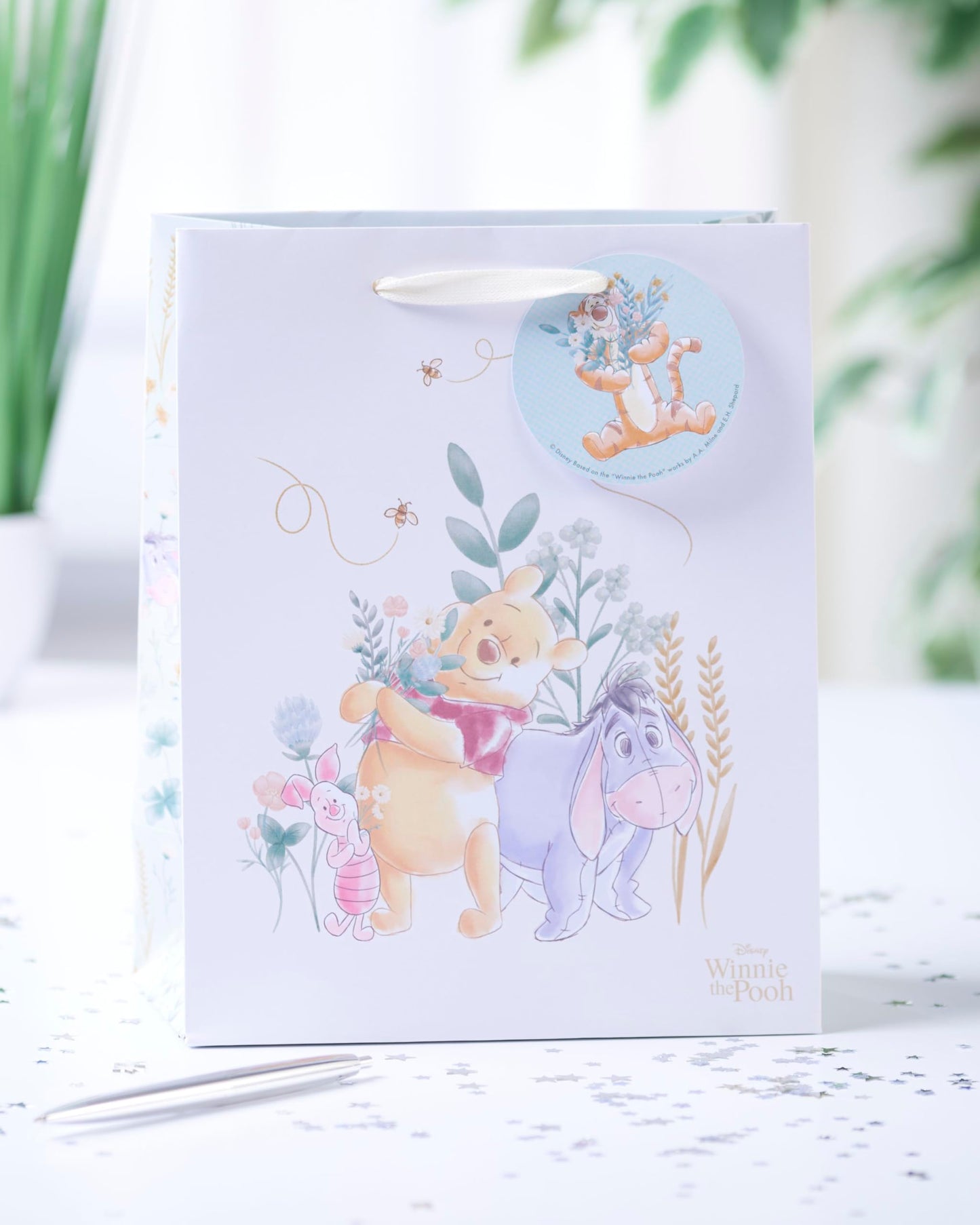 UK Greetings Disney Winnie The Pooh Medium Gift Bag for Him/Her/Friend - for Birthdays, Thank You & Other Events - Pooh & Eeyore Design