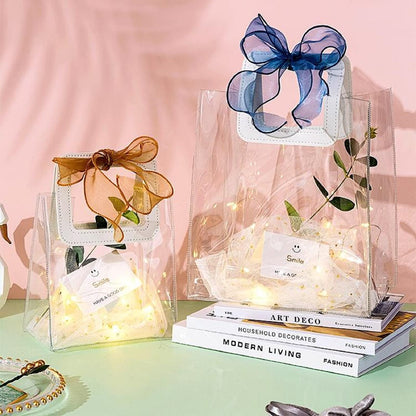 Rmannke Clear Gift Bag with Handle, 4 Pcs Transparent PVC Gift Bag, Heavy Duty Reusable Gift Wrap Bags for Bridal Party, Baby Shower, Wedding Favor, Shopping Bag Bulk- 7"x4" x8"