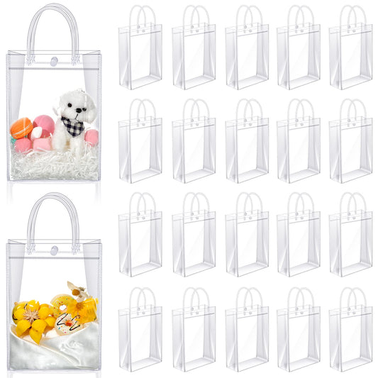 Saintrygo Clear PVC Gift Bags with Handles Reusable Plastic Wrap Tote Transparent Shopping Bags for Christmas Party Favors Weddings Merchandise Retail Small Business, 9 x 6.7 x 2.6 Inches(100 Pieces)