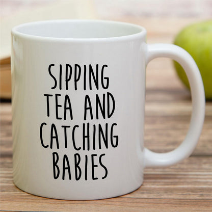 Retreez Funny Midwife Mug - Sipping Tea and Catching Babies Mug - 11 Oz Ceramic Coffee or Tea Cup - Appreciation, Thank-you, Birthday Gift for Midwife, Labor & Delivery Coach, OB Nurse, Coworkers