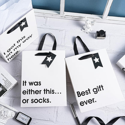 Loveinside Christmas Medium Size Gift Bags Set, Funny Quirky Design with Bold Black Text Pattern with Tissue Paper Perfect for Shopping, Parties, Birthday, Holiday, 4 Pack, 7" X 4" X 9"