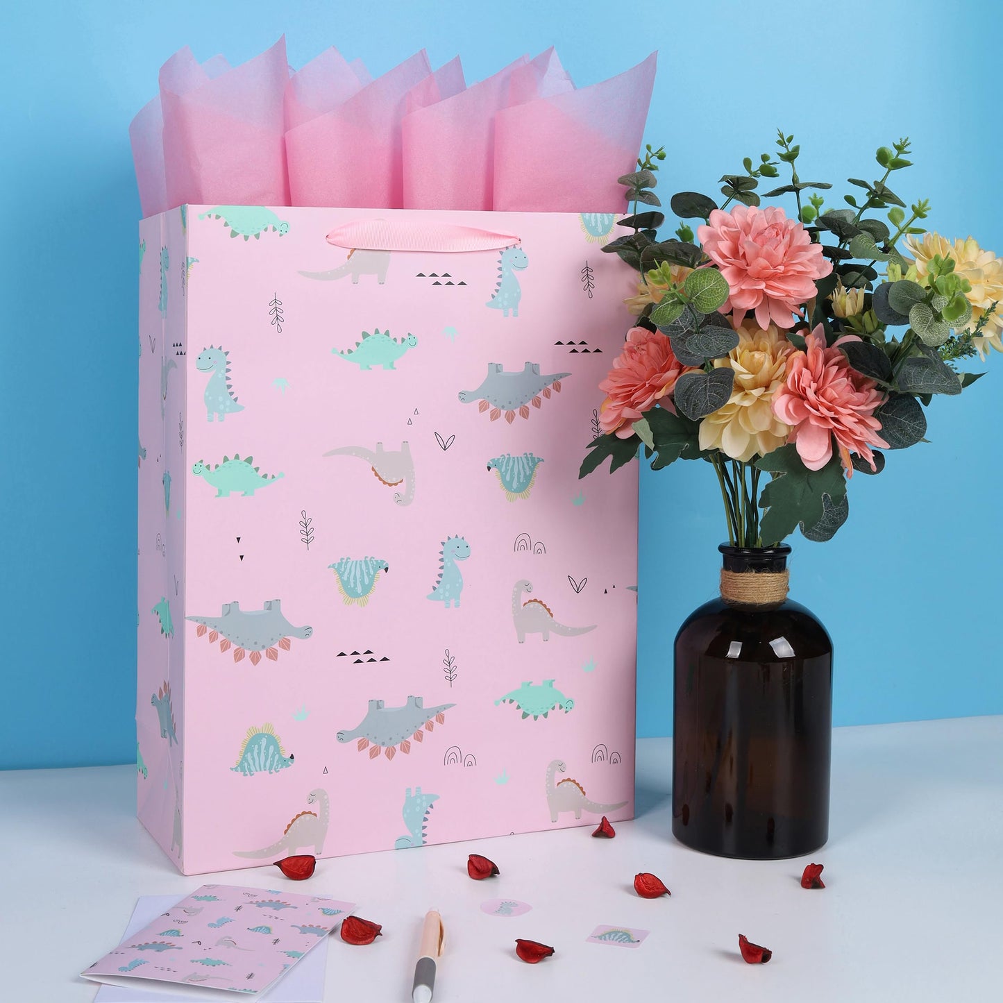 16.5” Extra Large Dinosaur Gift Bag Set with Handles, Greeting Card, Pink Tissue Papers and Stickers for Girls Kids Teens for Birthday Baby Shower Baby Girl Newborn New Moms, Dinosaur-themed Design, 1 Pcs