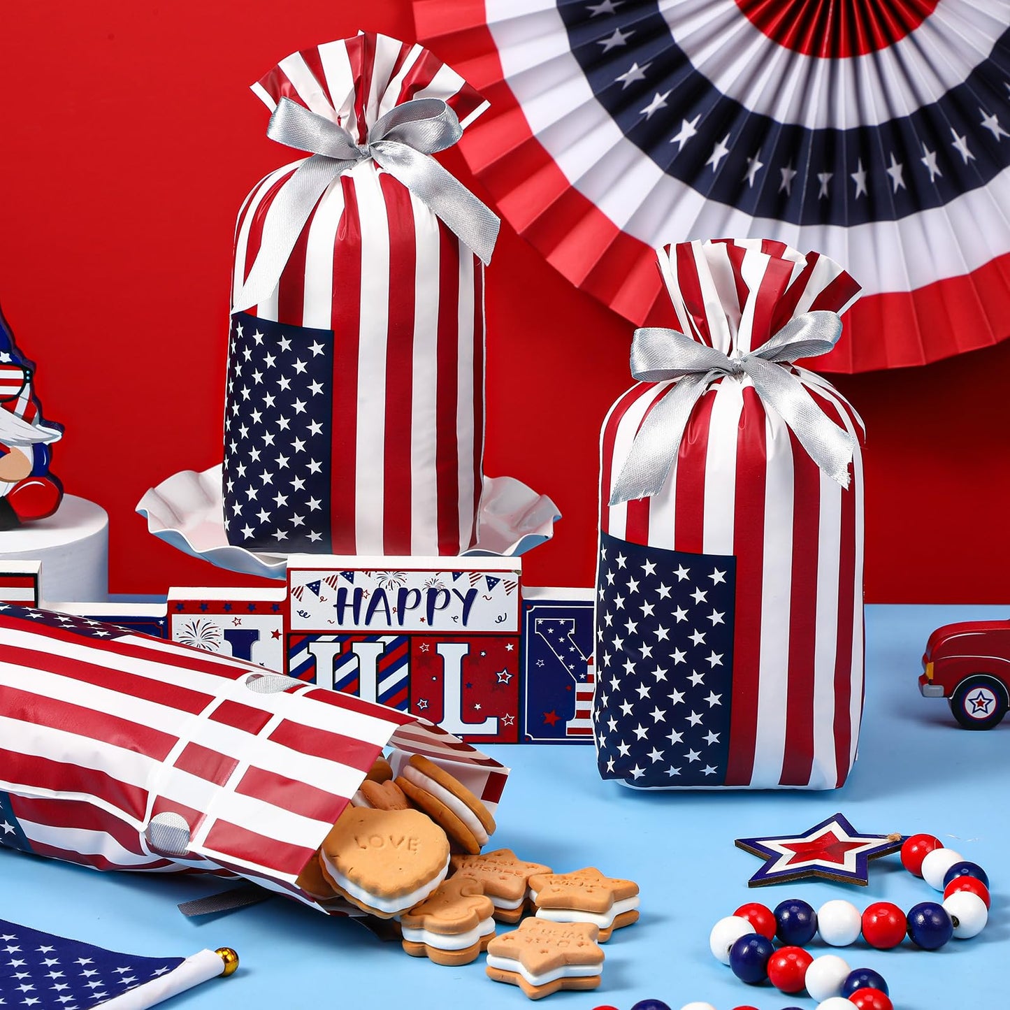 Clysee 100 Pcs Patriotic Gift Bags Bulk with Drawstring 4th of July Plastic American Flag Treat Goodie Bags USA Red Blue and White Candy Pouches Independence Day Patriotic Party Favors Supplies