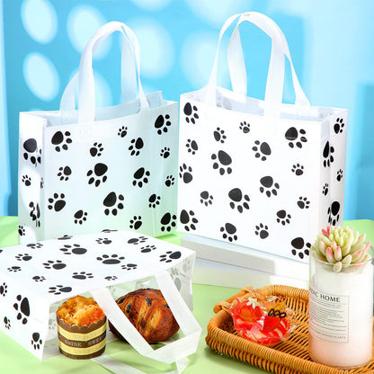 Frienda 20 Pieces Dog Gift Bags Non Woven Paw Print with Handle Pet Party Favor Paw Goodie Reusable Candy Bag for Birthday Party