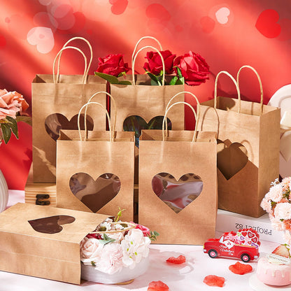 Eersida 24 Pcs Valentine's Day Gifts Bags with Heart Window Kraft Brown Paper Goodie Bag Bulk Holiday Candy Treat Wrapping with Handle for Galentines Wedding Birthday Party Supplies, 8.3"x5.9"x3.2"