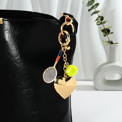 WOWORAMA Heart Bow Charm Keychain for Women Pearl Bow Tennis Bag Charm Ball Keyring Gold Heart Purse Charms for Handbags